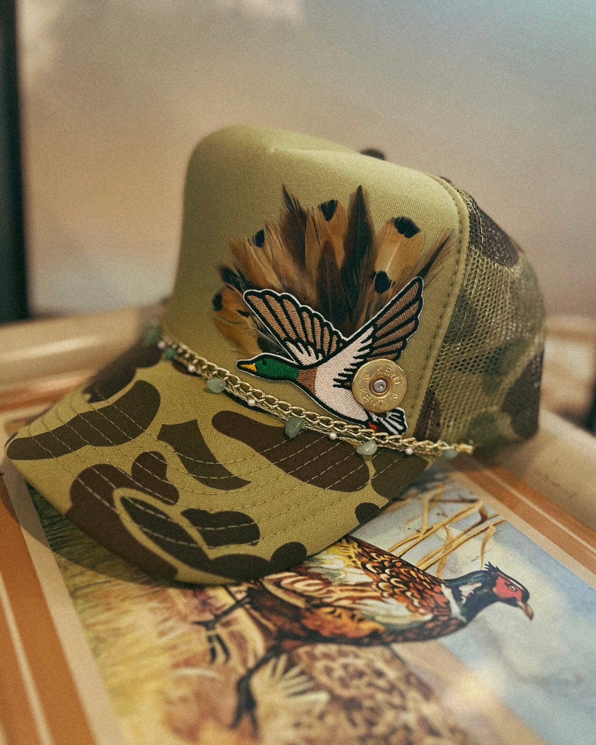 Feather Trucker Hat